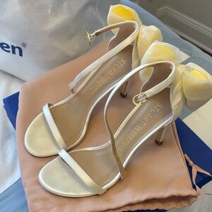 Stuart Weitzman Ivory Satin Ankle-Strap Heels with Floral Accent